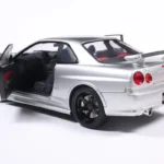 NISSAN SKYLINE GT-R (BNR34) WITH NISMO PARTS SILVER 1999 miniature 1/18 Solido collection