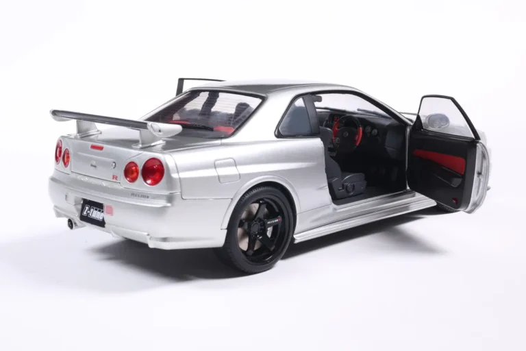 NISSAN SKYLINE GT-R (BNR34) WITH NISMO PARTS SILVER 1999 miniature 1/18 Solido collection