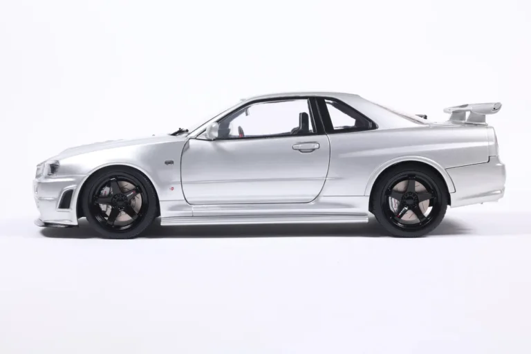 NISSAN SKYLINE GT-R (BNR34) WITH NISMO PARTS SILVER 1999 miniature 1/18 Solido collection