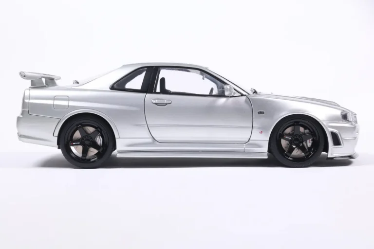 NISSAN SKYLINE GT-R (BNR34) WITH NISMO PARTS SILVER 1999 miniature 1/18 Solido collection