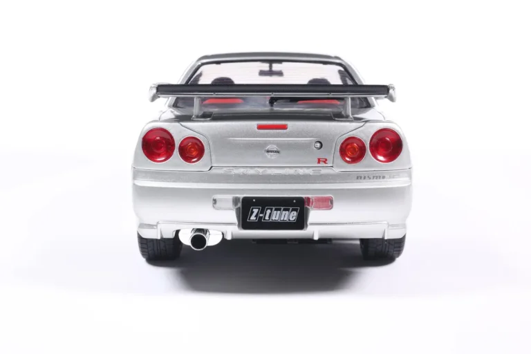 NISSAN SKYLINE GT-R (BNR34) WITH NISMO PARTS SILVER 1999 miniature 1/18 Solido collection