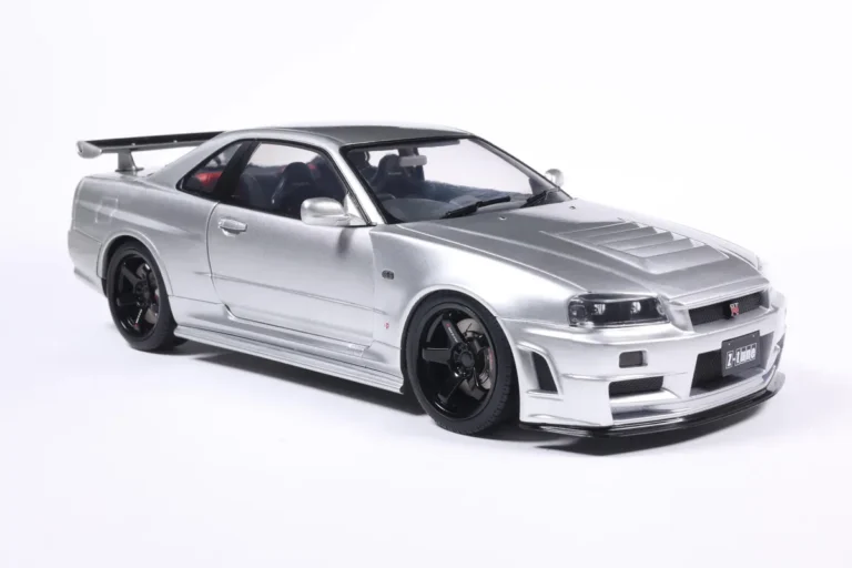 NISSAN SKYLINE GT-R (BNR34) WITH NISMO PARTS SILVER 1999 miniature 1/18 Solido collection