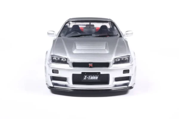 NISSAN SKYLINE GT-R (BNR34) WITH NISMO PARTS SILVER 1999 - 1/18 Solido NISSAN SKYLINE GT-R (BNR34) WITH NISMO PARTS SILVER 1999 miniature 1/18 Solido vue de face