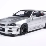 NISSAN SKYLINE GT-R (BNR34) WITH NISMO PARTS SILVER 1999 miniature 1/18 Solido vue avant gauche