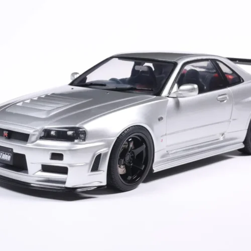 NISSAN SKYLINE GT-R (BNR34) WITH NISMO PARTS SILVER 1999 miniature 1/18 Solido vue avant gauche
