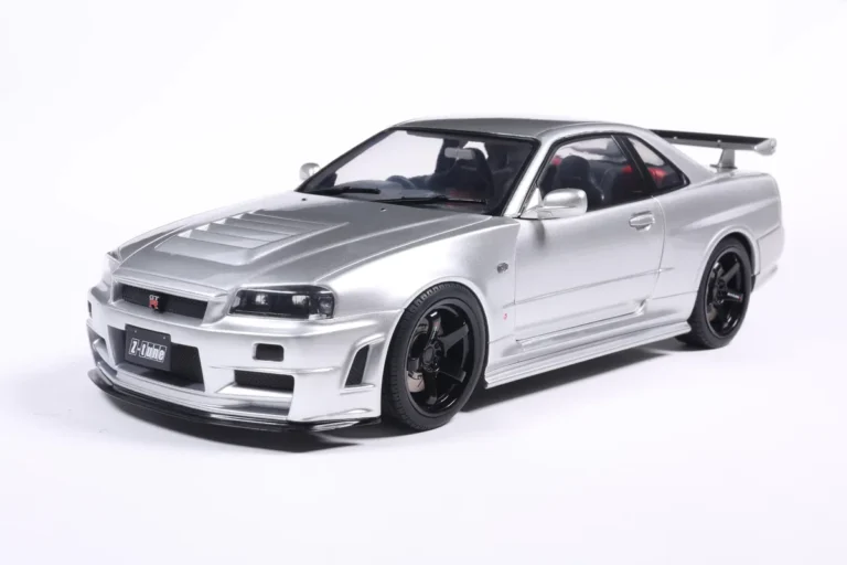 NISSAN SKYLINE GT-R (BNR34) WITH NISMO PARTS SILVER 1999 miniature 1/18 Solido vue avant gauche